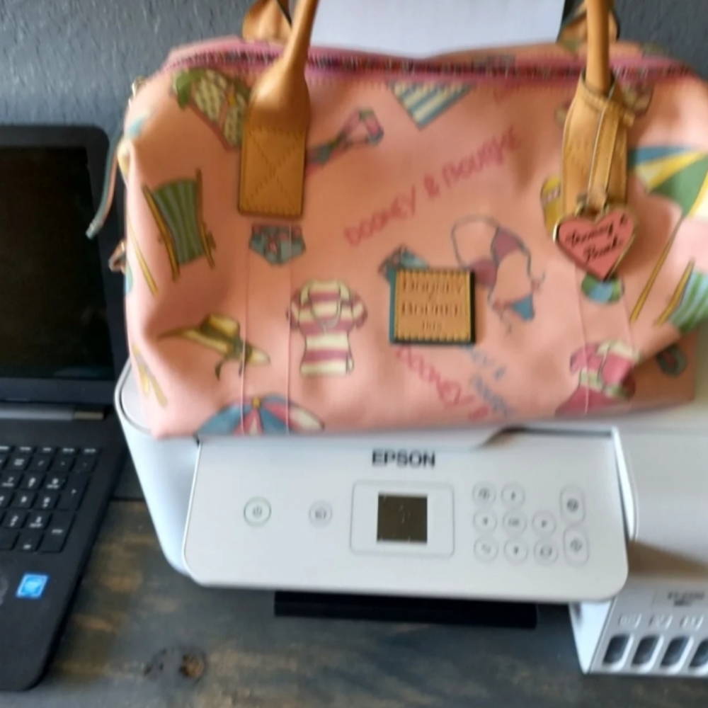 Dooney and Bourke summer theme